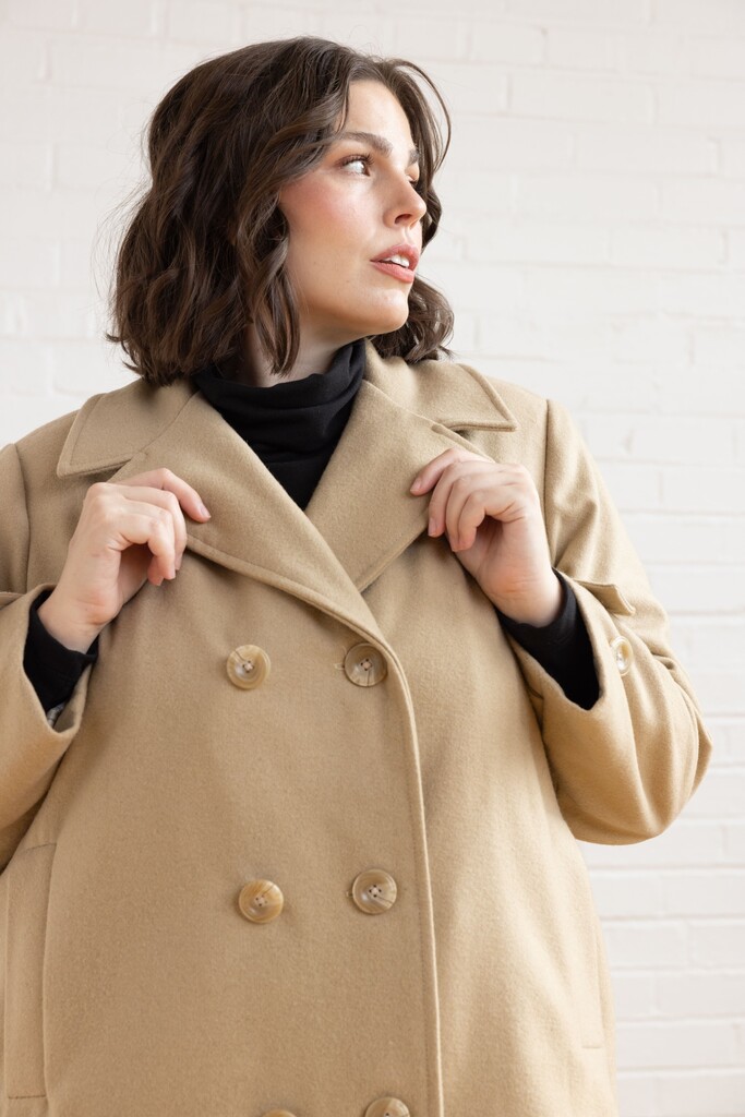 Model wearing navy Maple peacoat