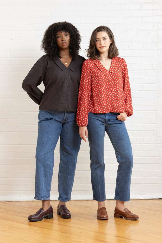 Women modeling the Cosmo blouses