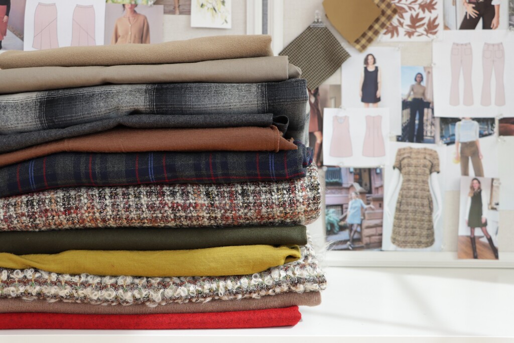 Array of different coating fabrics laid out folded