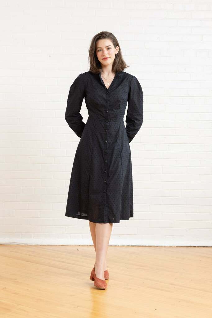 woman wearing black Brom dress