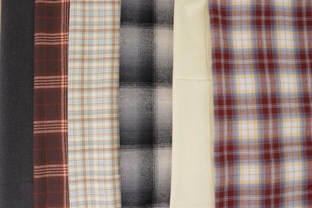 Collection of garments made in flannel showing different pattern styles