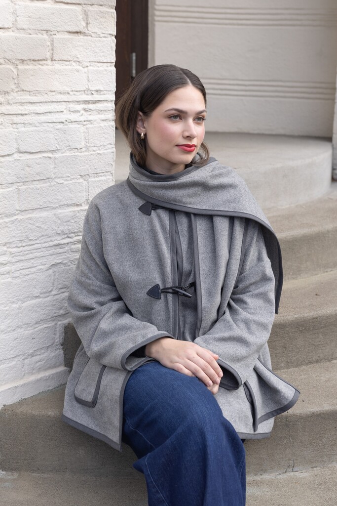woman modeling gray Ivy coat outside